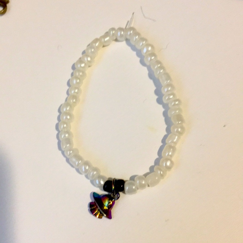 Bracket with alien spaceship charm!